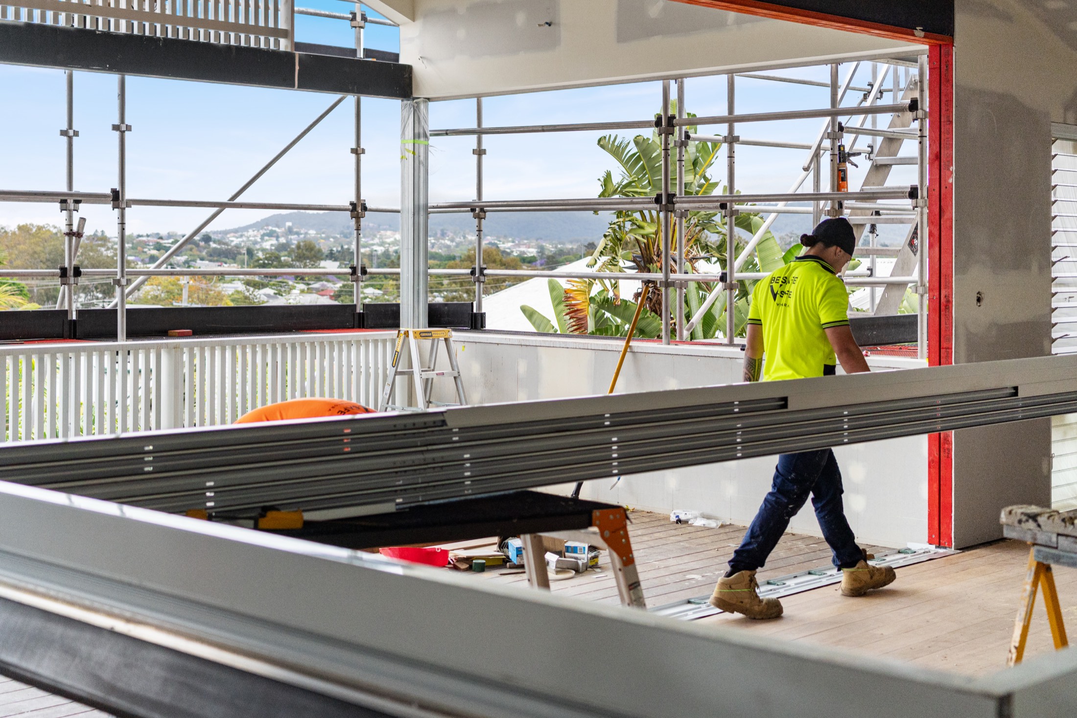 Carrying a long beam across the open deck