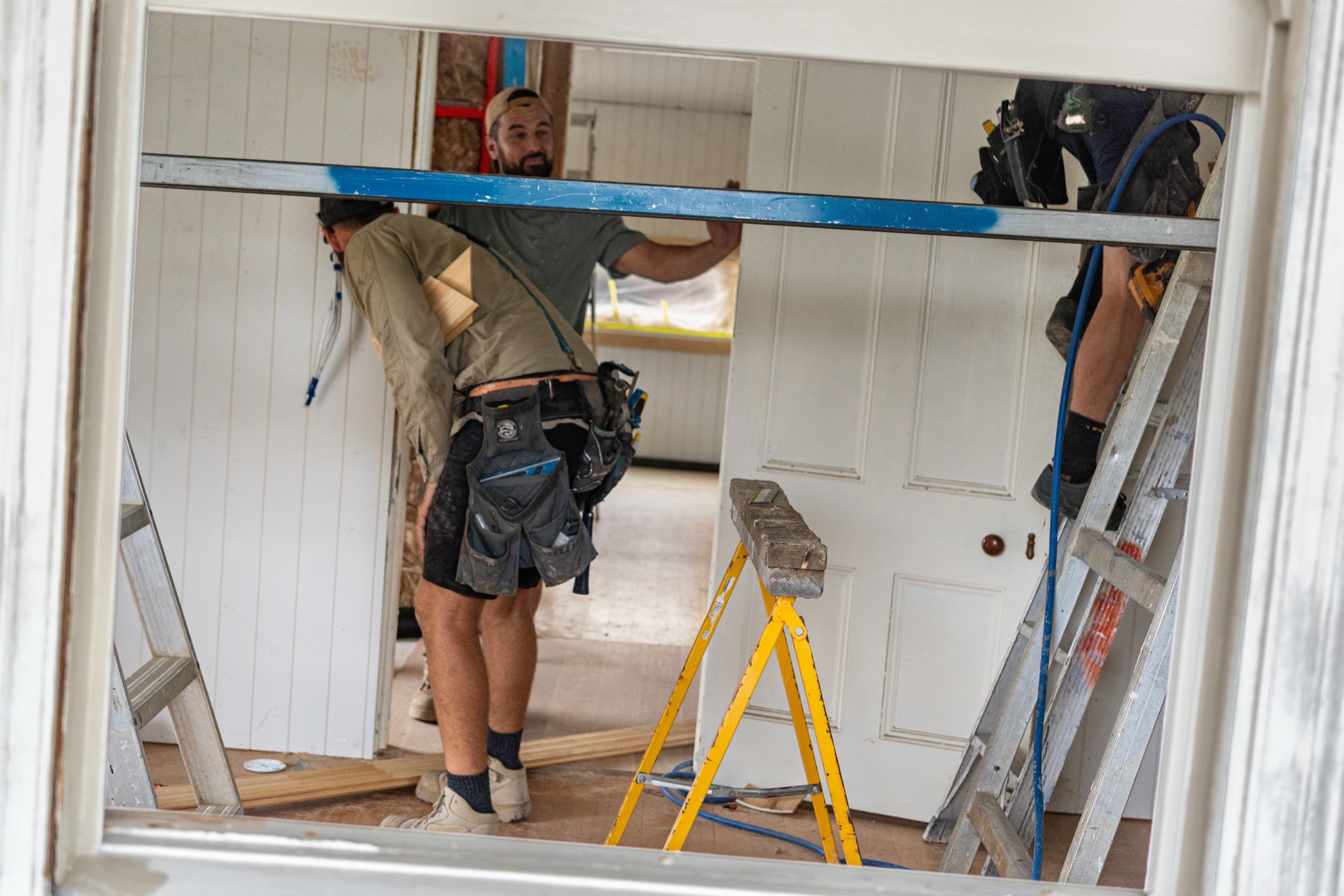 Checking a door opening with a long level
